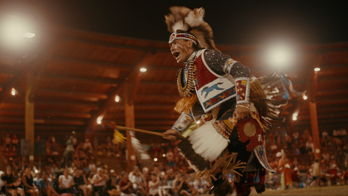 Julian Brave NoiseCat competes at the Kamloopa Powwow held on the campus of the formerIndian residential school where the first suspected graves of students were discovered inCanada. (Credit: Emily Kassie/Sugarcane Film LLC)