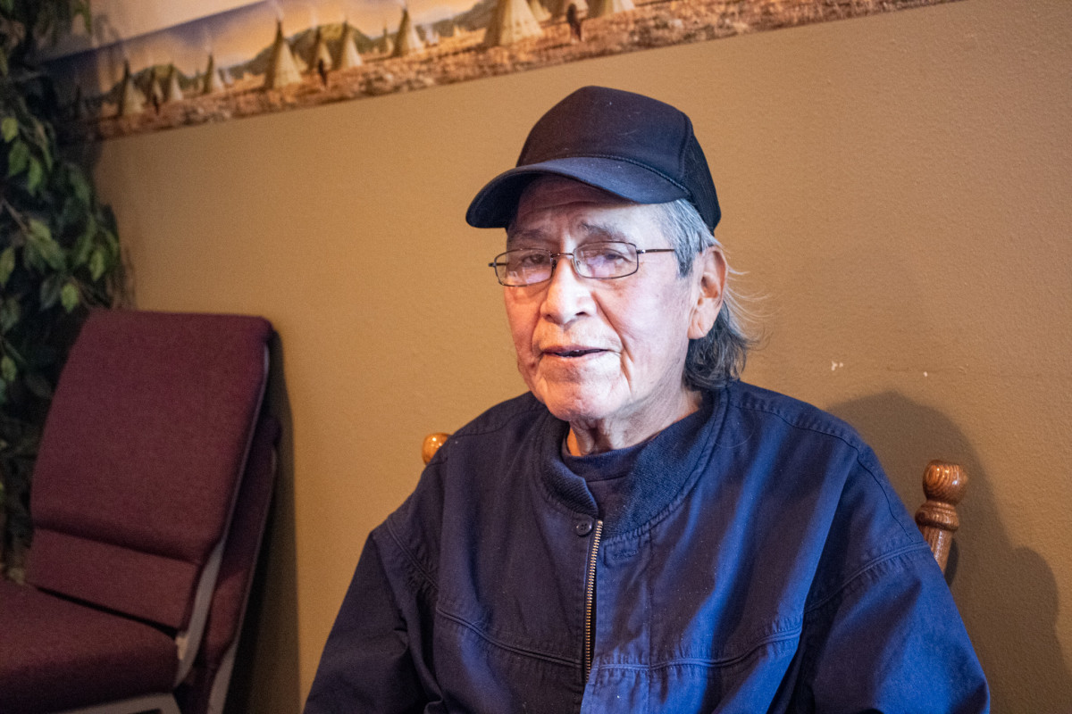 Theodore Ten Fingers, 71, is the descendant of James Pipe on Head a survivor of the 1890 Wounded Knee Massacre. Pipe on Head was Ten Finger's grandfather. (Photo by Amelia Schafer, ICT/Rapid City Journal)