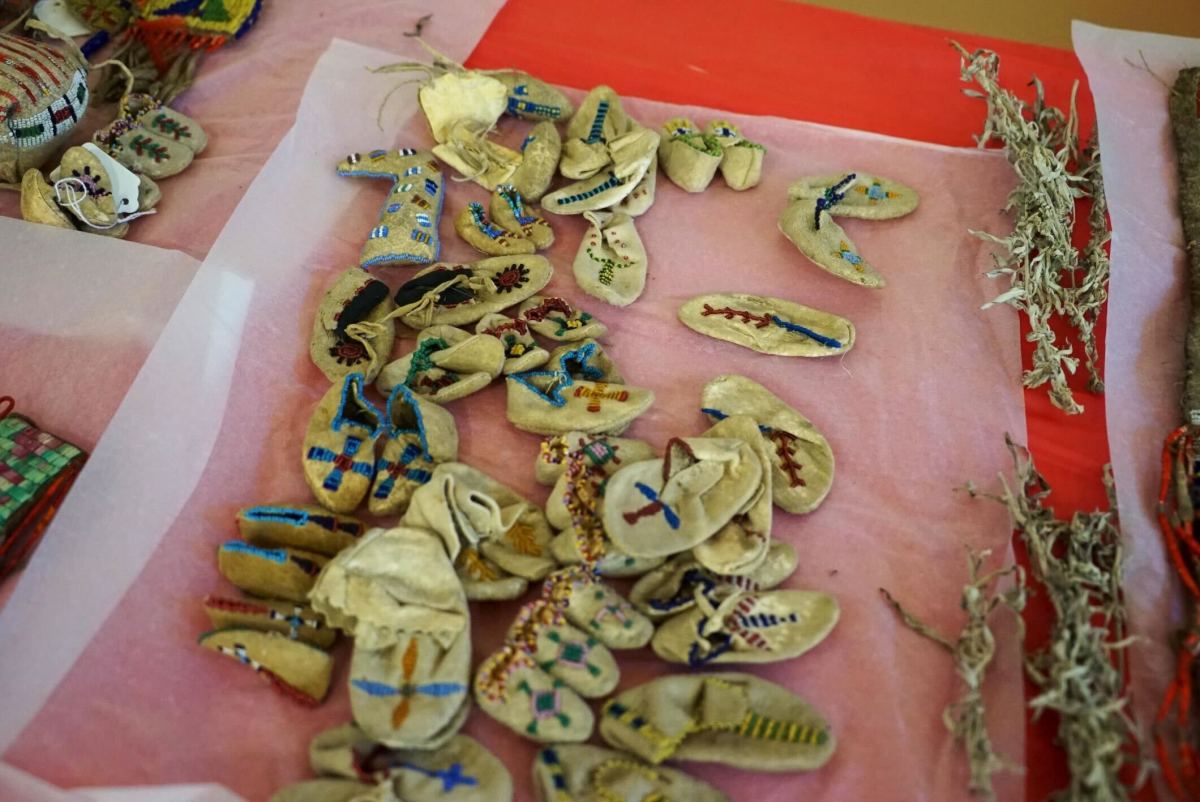 Children's moccasins taken from the graves of Wounded Knee Massacre victims were housed in the Woods Memorial Library in Barre, Massachusetts. (Photo courtesy of Cedric Broken Nose)