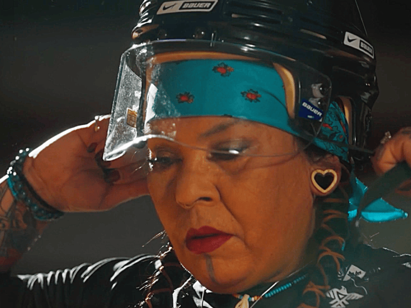 Native American Roller Derby athlete puts on helment